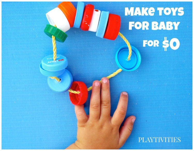 Kid hand touching Recycled DIY Toy For Baby