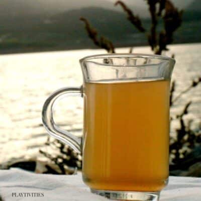 Glass cup of ginger tea.