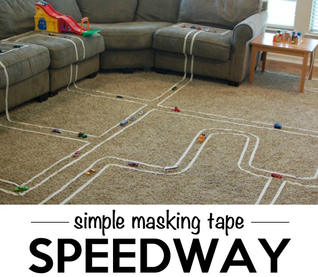 Masking tape speedway in a living room.
