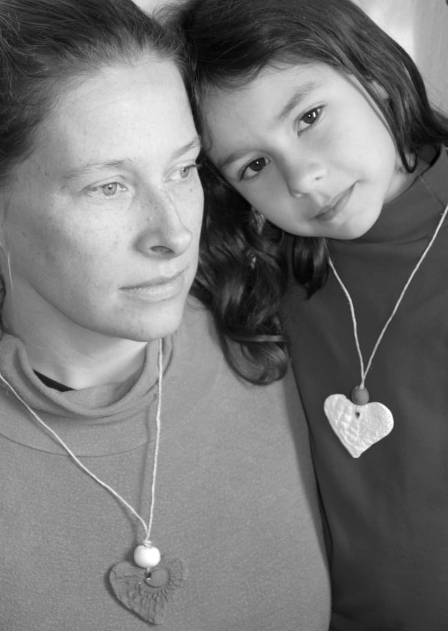 MOther and daughter wearing diffuser necklace