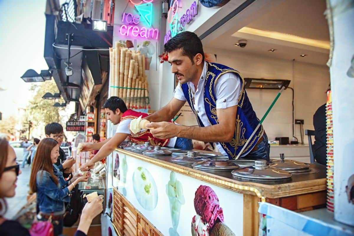 Traditional ice-cream sellers on market.