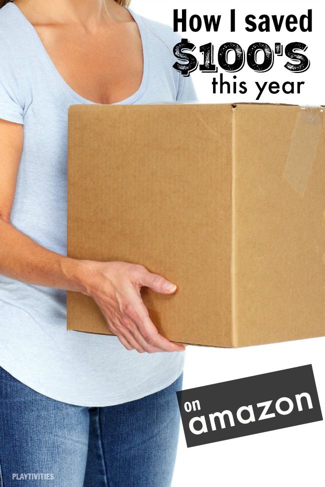 Woman holding a big cardboard box.
