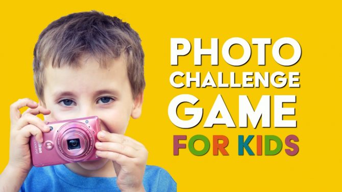 Young boy holding a camera next to sign - Photo Challenge Game For KIds