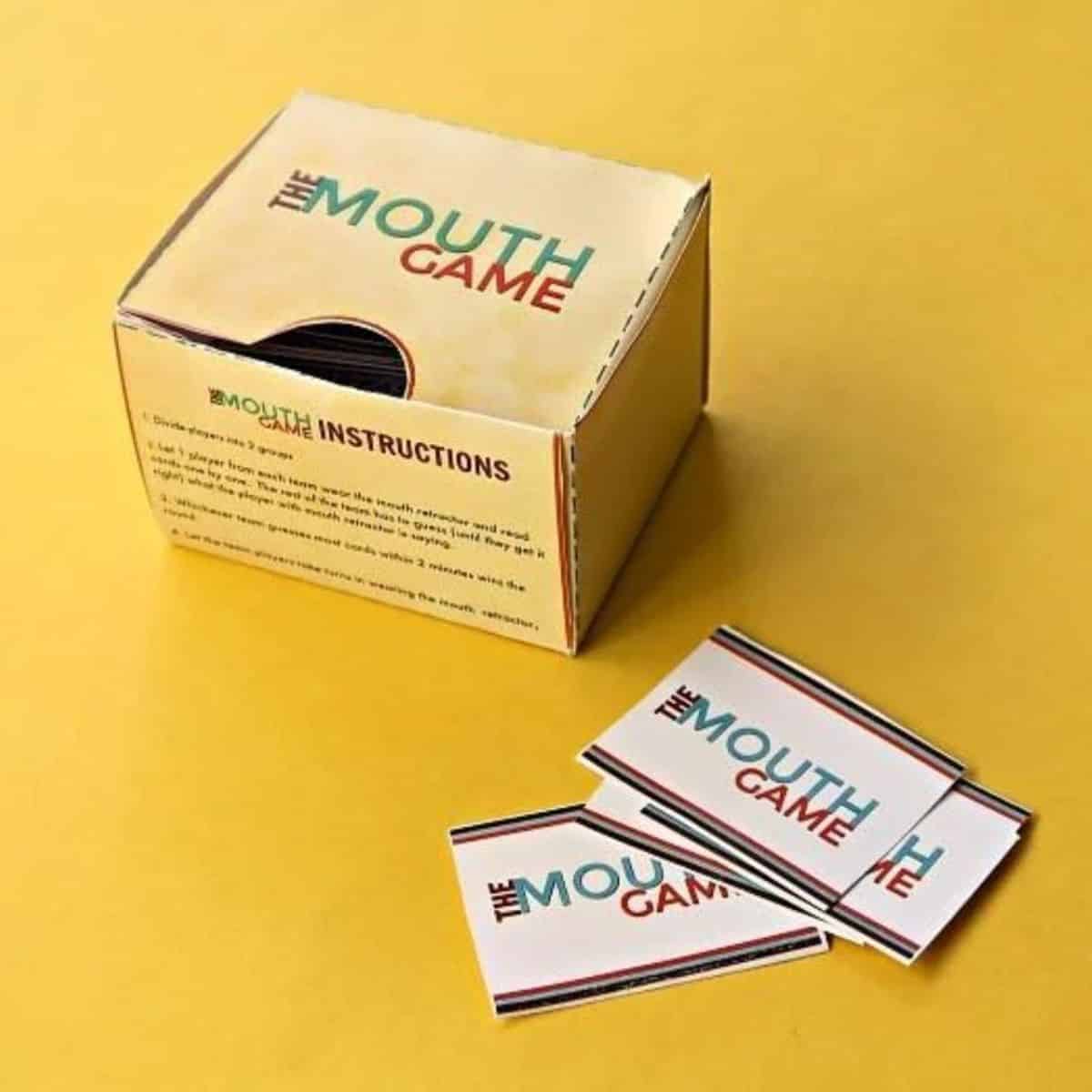 Mouth game box with a labels on a yellow background.