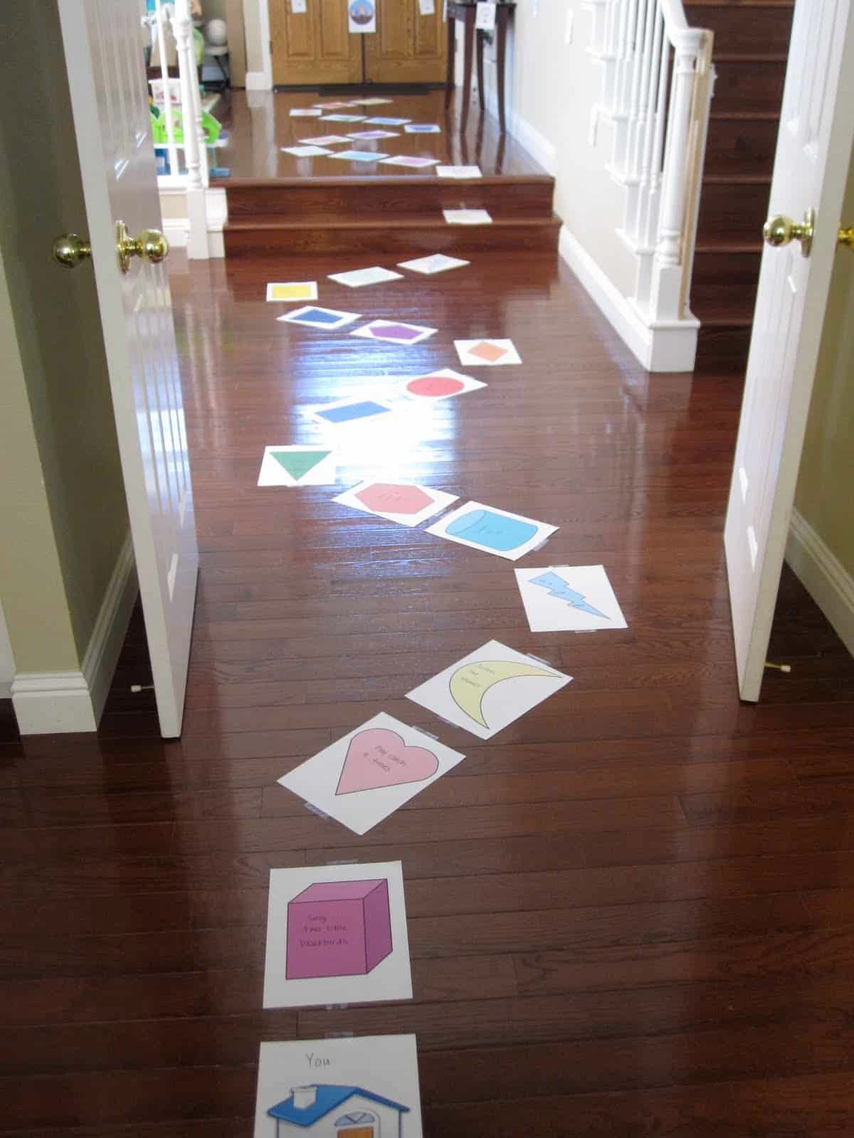 Bunch of obstacle course sheets spreaded on the floor in a house
