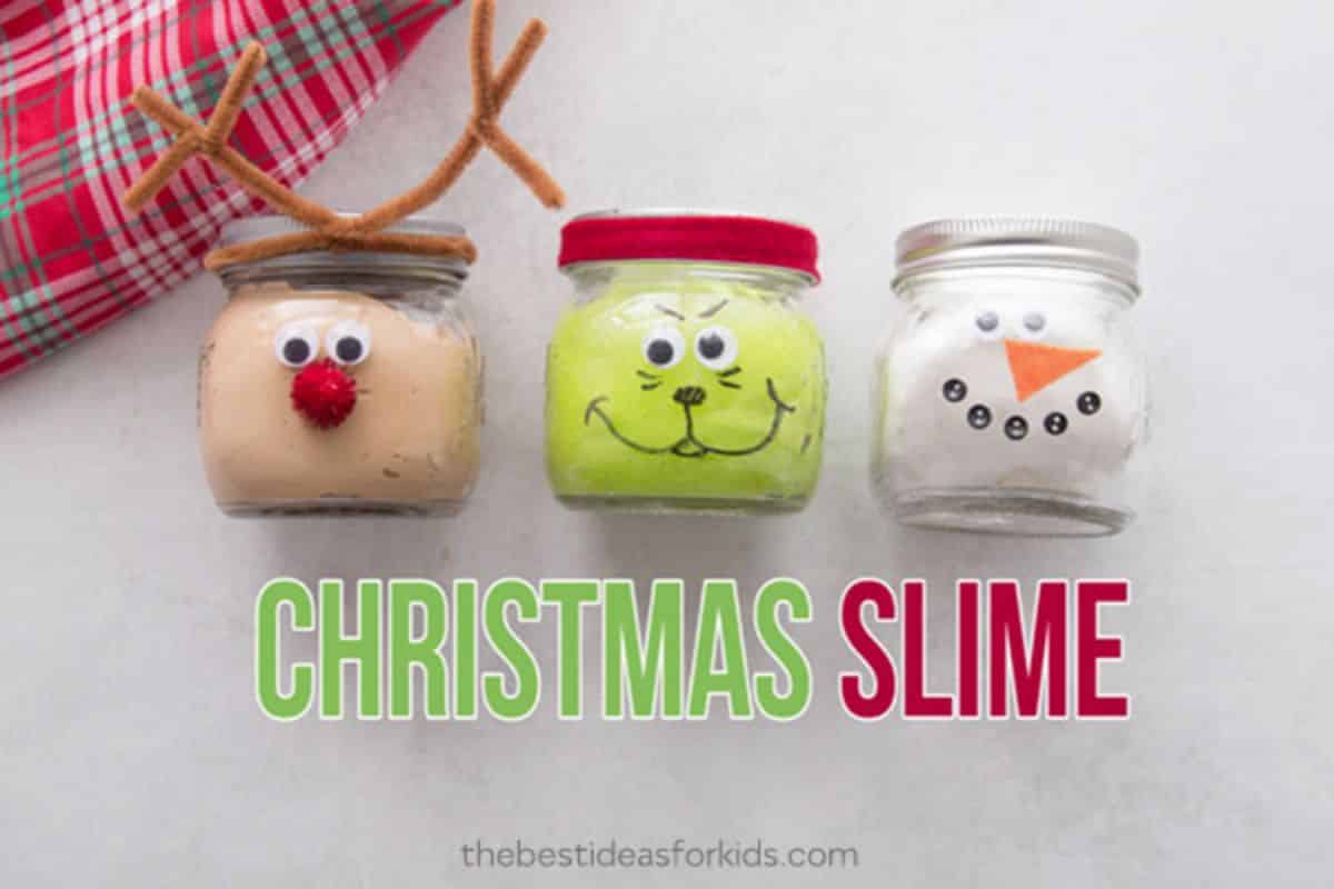Christmas slime in three glass jars decorated as christmas characters.