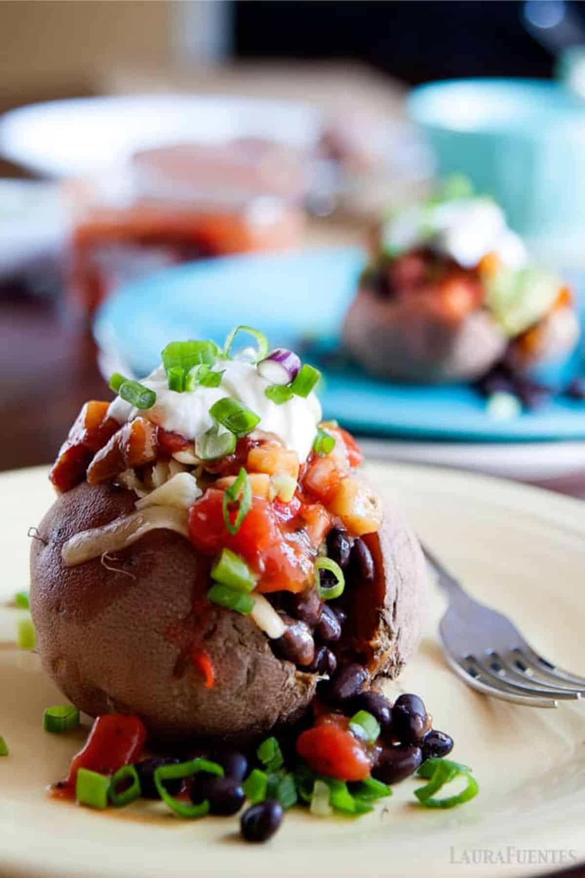 Stuffed Sweet Potato Toppings on a plate with a fork.