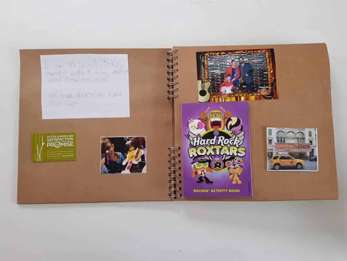 Homemade holiday scrapbook made from carboard and photos.