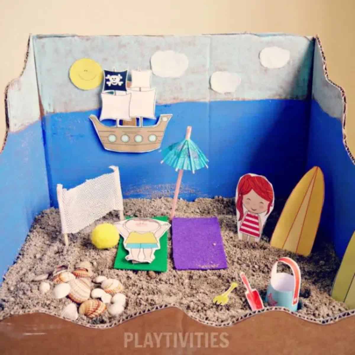 Miniature beach play set from cardboard.