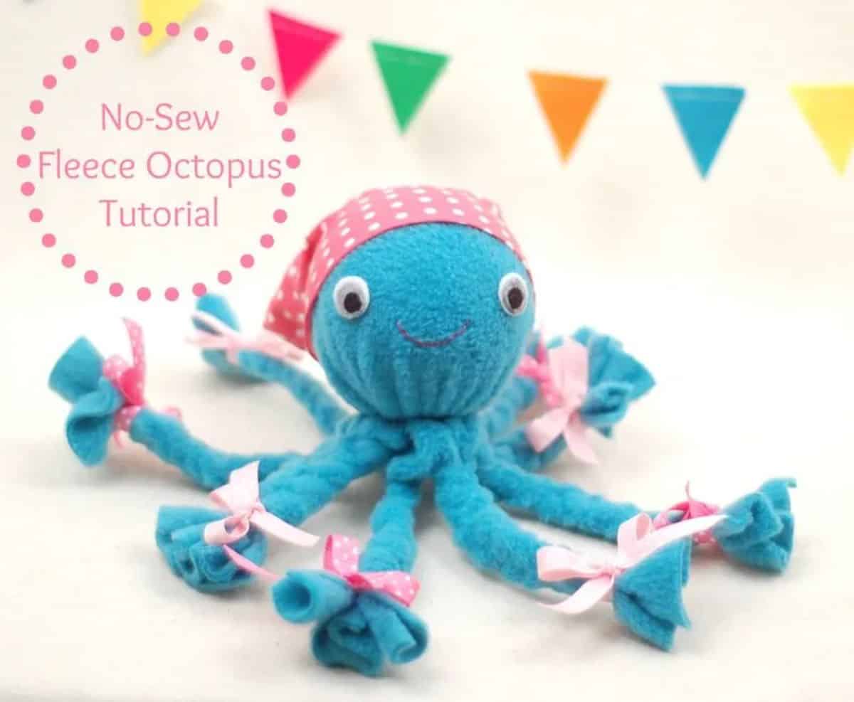Blue fleece octopus toy with bandana.