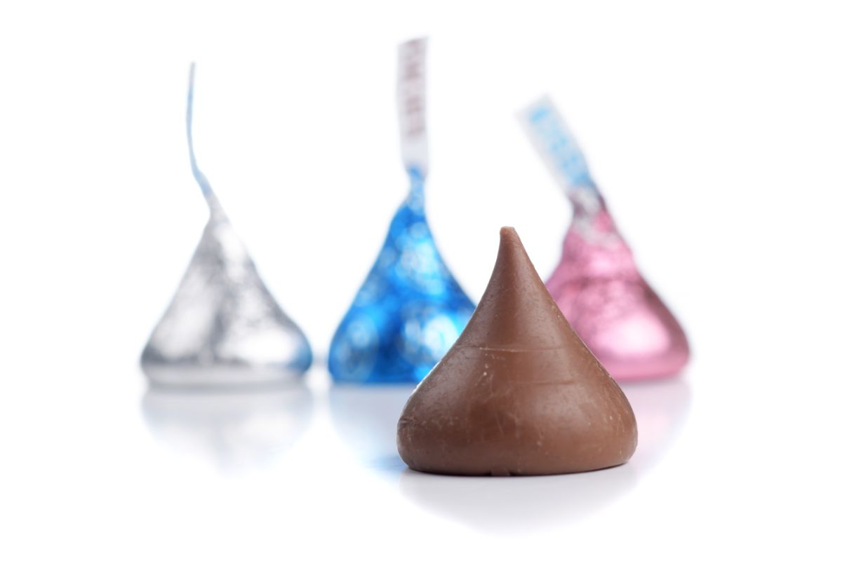 4 hershey's kisses, one unwrapped