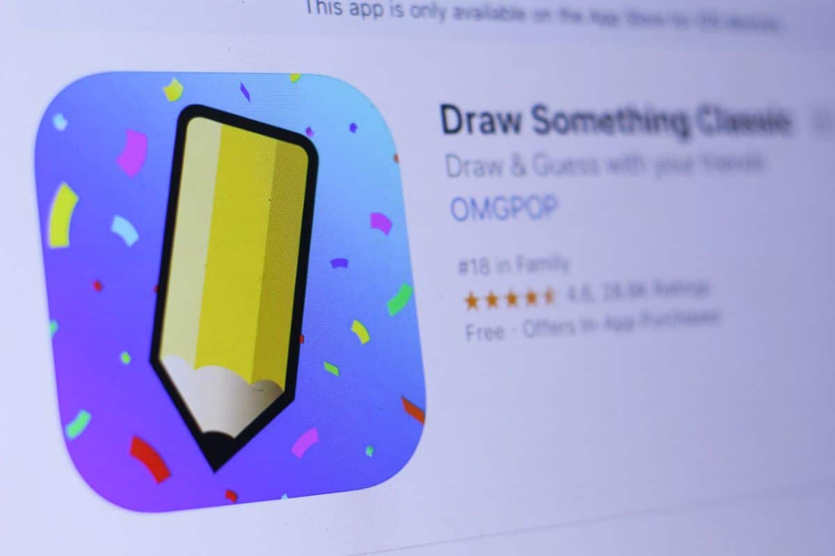 a close up of a screenshot of the draw something app. The image is of a yellow pencil on a blue, confetti background