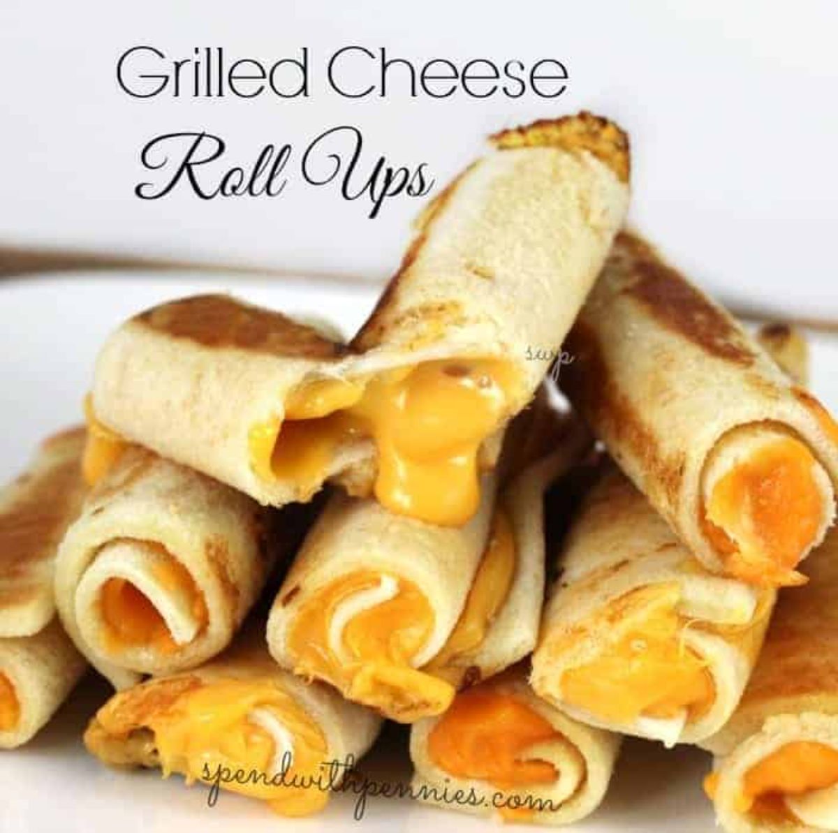 The text reads "Grilled cheese roll ups" the image is of a pile of grilled cheese roll ups
