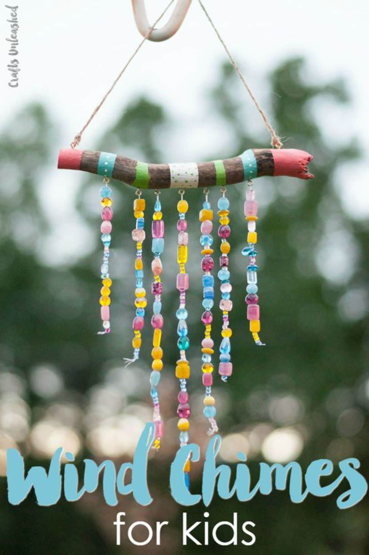 the text reads "Wind Chimes for kids" the image is of a eind chime made of twigs, string and beads