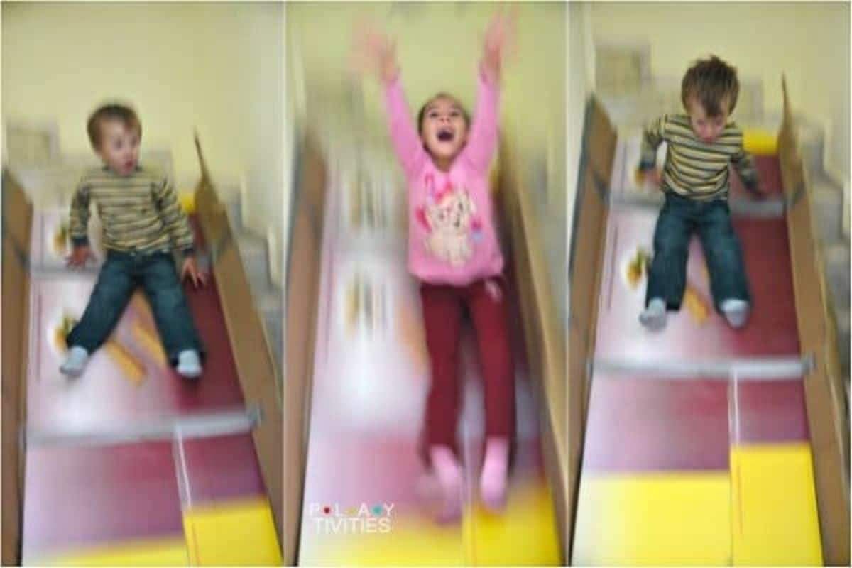 3 images of an indoor slide made from cardboard.