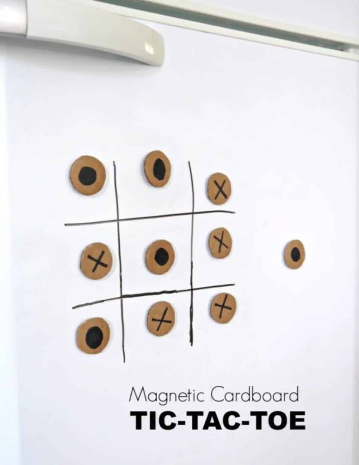 Magnetic cardboard tic-tac-toe game