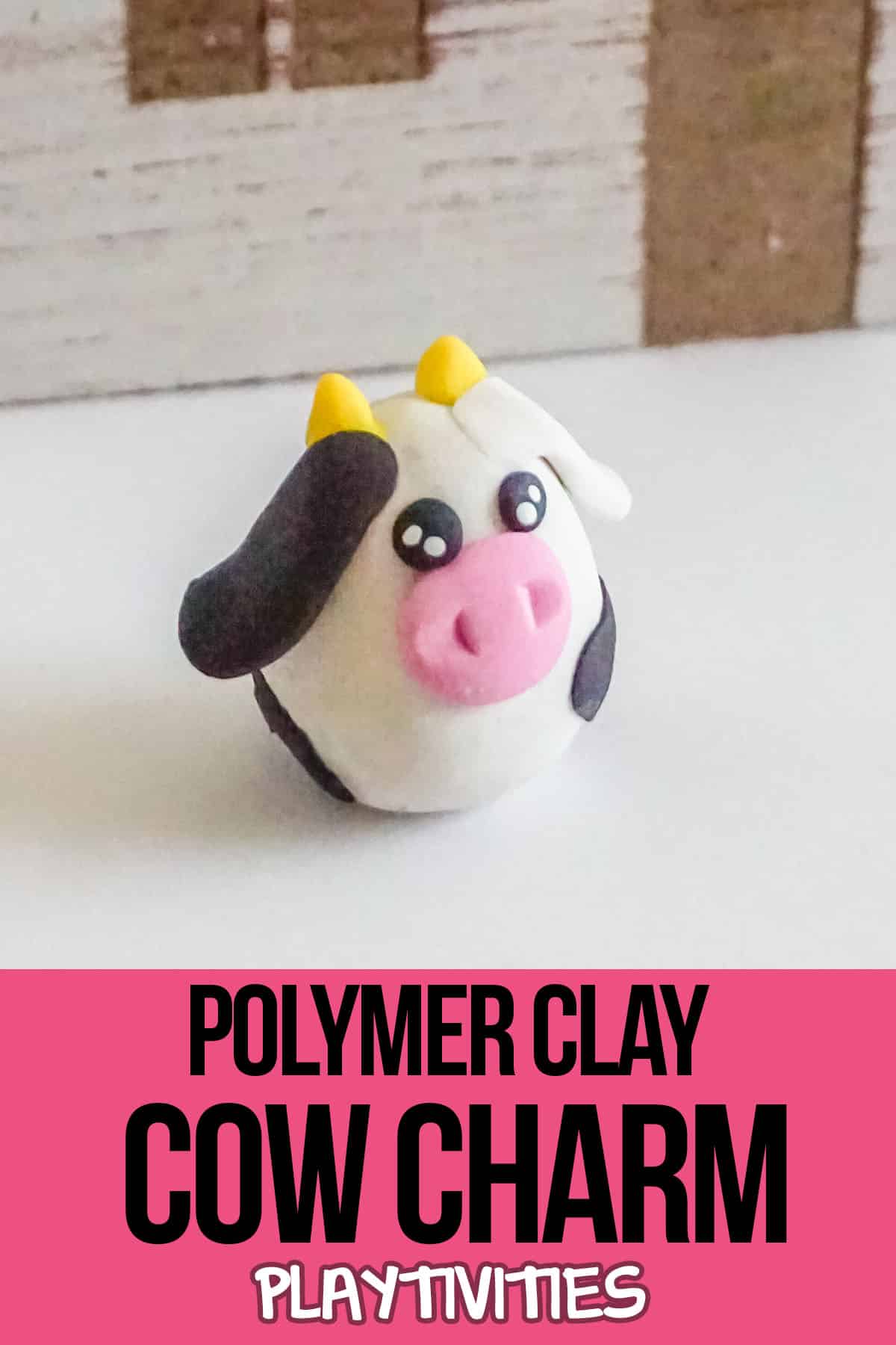 easy kids DIY clay cow craft with text which reads polymer clay cow charm