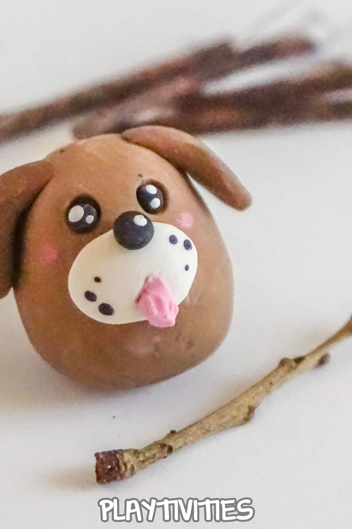 closeup of cute puppy made from polymer clay