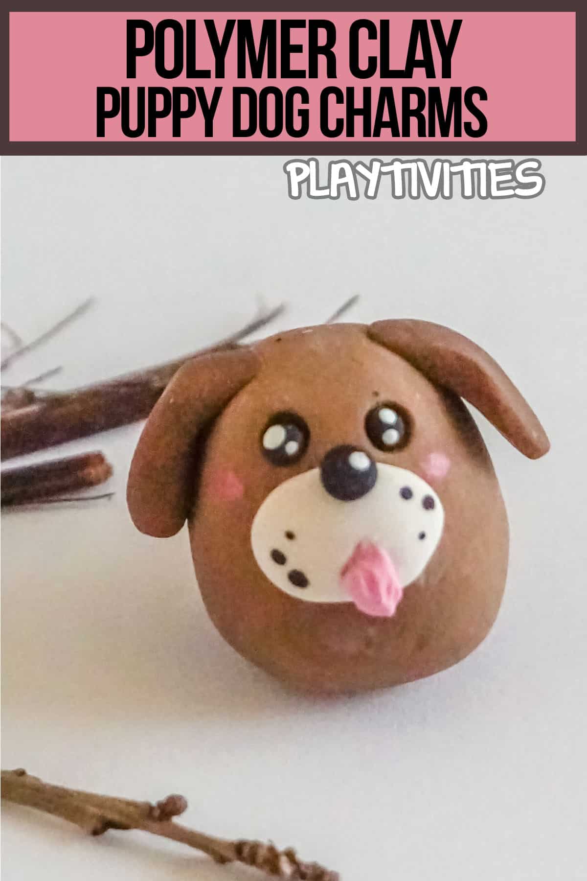 polymer clay puppy charm with text which reads polymer clay puppy dog charm