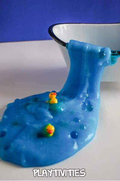 rubber ducky slime spilling out of a tiny bathtub